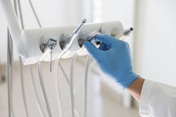 Professional Tooth Extraction technician working in Five Points, NC